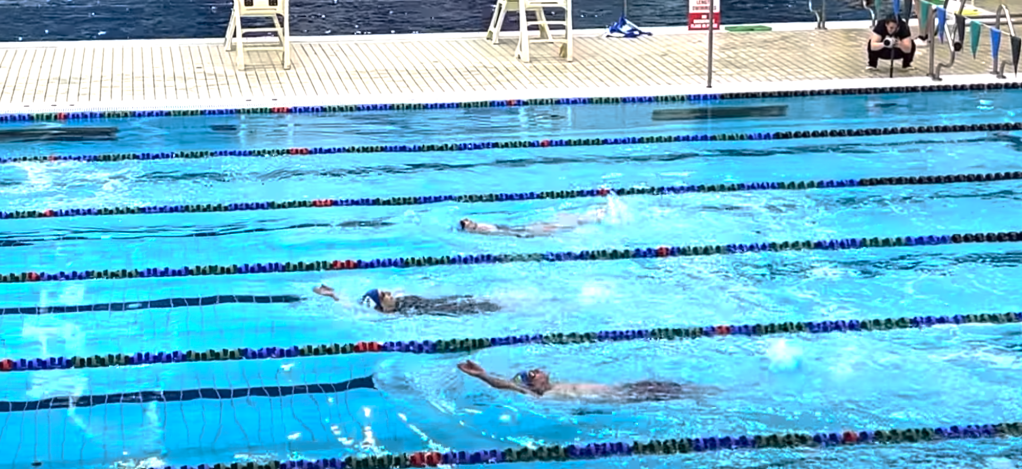 Betty Brussel Breaking Backstroke Record